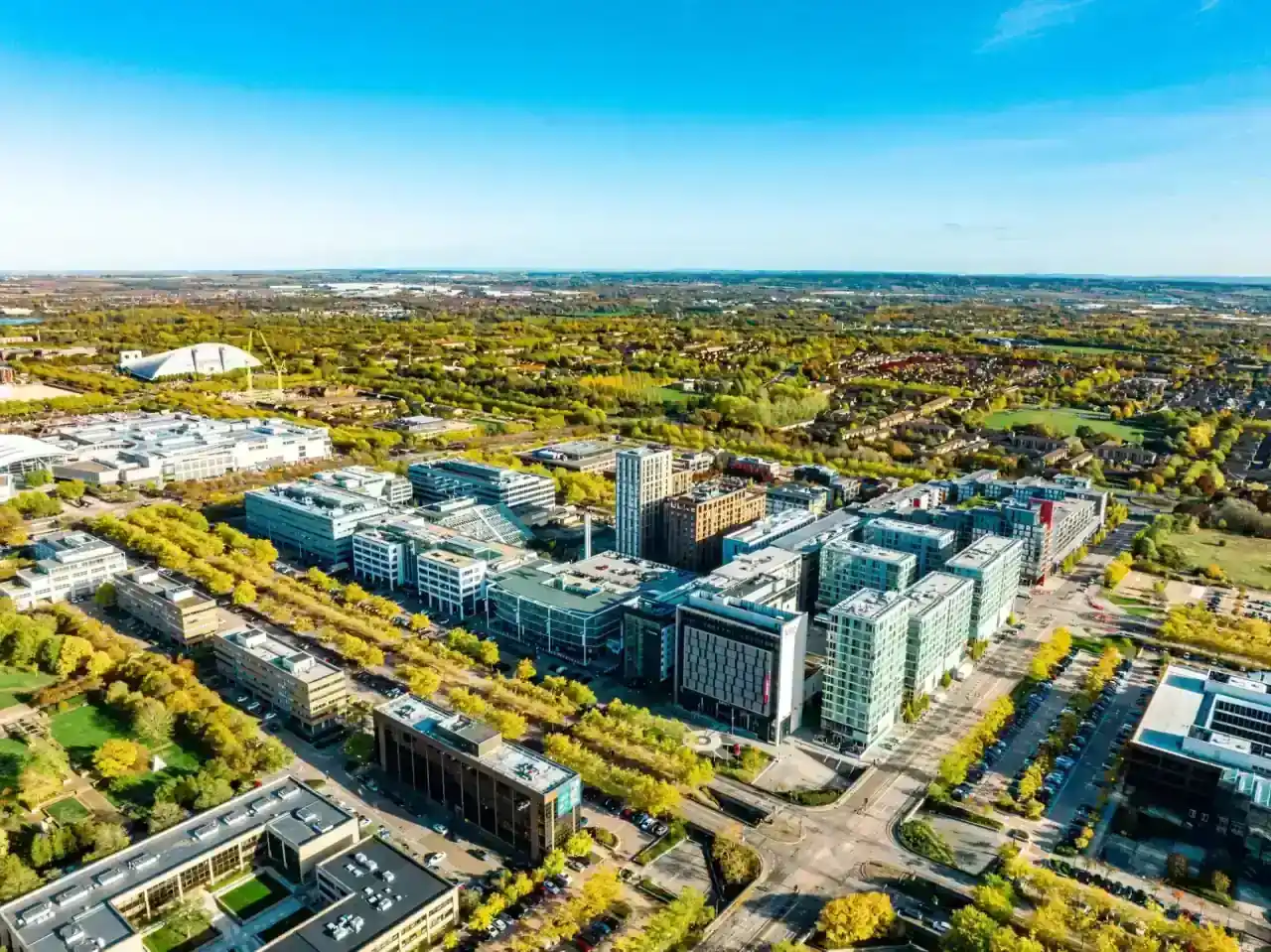 Aerial view of a busy retail and commercial district in the South East